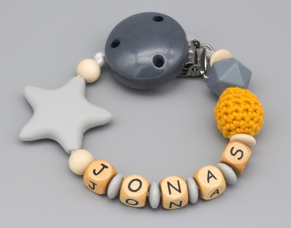 Schnullerkette mit Silikonstern, Silikonperle und Häkelperle und Namen
