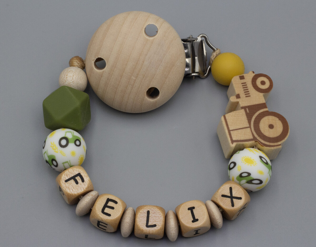 Schnullerkette mit Wunschnamen Traktor und Silikonperlen Bild 1